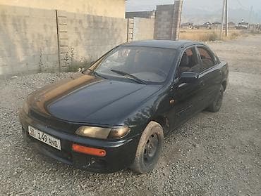 Mazda 323: 1996 г., 1.8 л, Механика, Бензин, Седан — 1