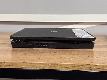 helldivers 2: PlayStation 4 Slim (черная) с двумя геймпадами DualShock 4 (черный и — 2
