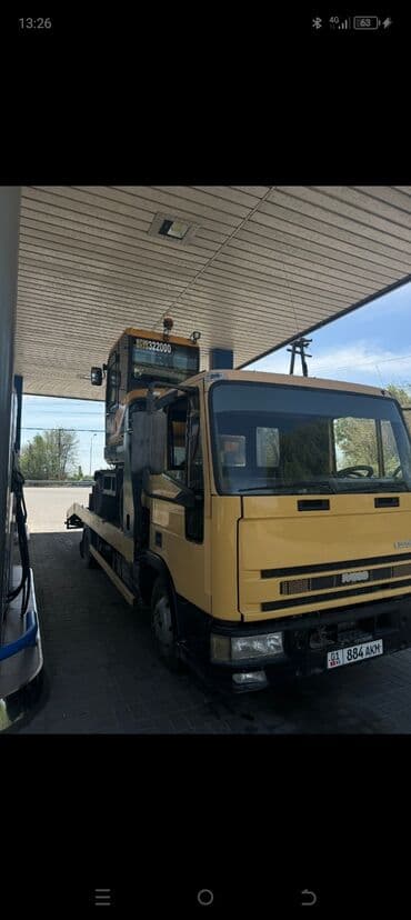 шины на эксковатор: Колесный экскаватор Hyundai, выполненный в характерной для бренда — 7