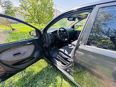 100 с4: Daihatsu Cuore: 2004 г., 1 л, Ручные, Бензин, Хэтчбэк — 9