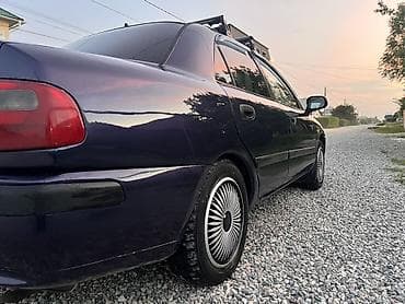 муссо автомобиль: Mitsubishi Carisma: 2000 г., Газ, Седан — 4