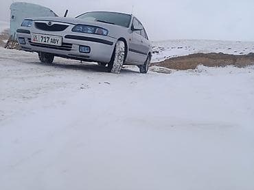 Mazda: Mazda 626: 1997 г., 2 л, Механика, Бензин, Седан — 4
