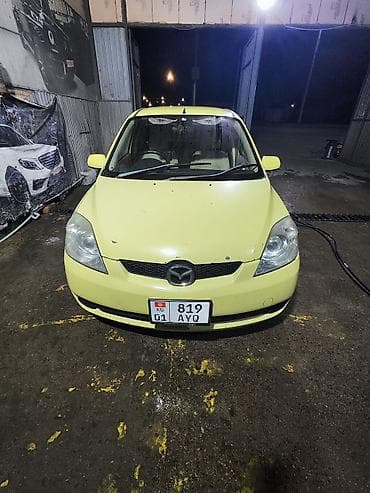 Mazda Demio: 2004 г., 1.3 л, Автомат, Газ, Хэтчбэк