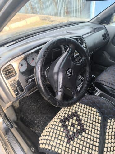 шины на москвич: Nissan Primera: 2001 г., 1.8 л, Механика, Бензиновая, Универсал — 5