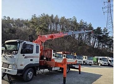 Автовышка на шасси грузовика. - Телескопическая стрела с