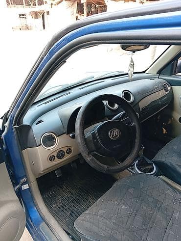 wuling mini ev: LIFAN Smily (320): 2012 г., Механика, Хэтчбэк — 1