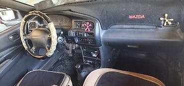 genesis 80: Mazda 323: 1996 г., 1.3 л, Механика, Бензин, Седан — 5