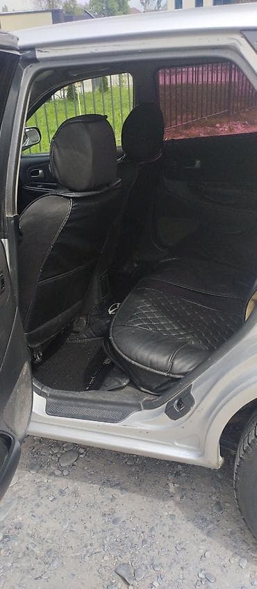 авто мазда: Mazda 323: 2001 г., 1.6 л, Механика, Газ, Универсал — 9