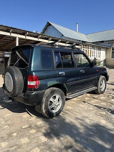 sprinter 315: Mitsubishi Pajero iO: 2004 г., 2 л, Автомат, Бензин, Внедорожник — 5