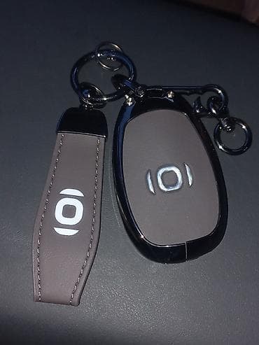 Аксессуары для салона: Продаётся чехол для ключей CHANGAN Q05 коричневый цвет доставка — 6