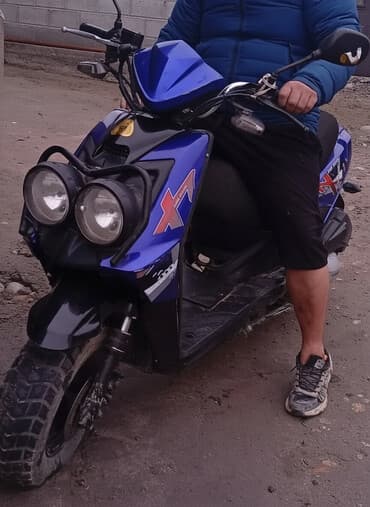 сукутер мапет: Скутер X7, цвет сине‑черный. - Форм‑фактор: городской/кросс-стиль. - — 1