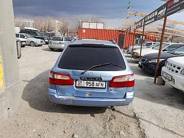 subaru forester авто: Mazda 626: 2001 г., Механика, Бензин, Универсал — 4