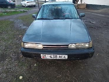 Транспорт: Mazda 626: 1990 г., 2 л, Механика, Бензин, Седан — 1