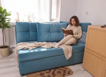 надувные диваныматрасы для сна: Угловой диван с обивкой приятного бирюзового цвета. Диван — 1