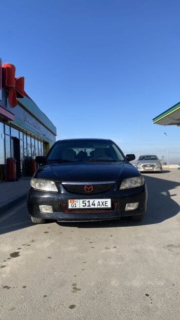 Mazda : 2002 г., 1.6 л, Механика, Бензин, Хэтчбэк