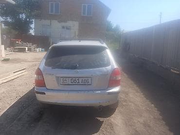 двигатель rf1: Mazda 323: 1999 г., 1.5 л, Механика, Универсал — 1