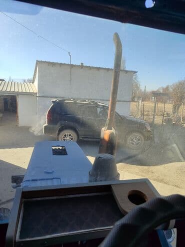 продаю в связи с переездом: Трактор колесный синего цвета с прицепом. Телешкасы менен сатылат — 14