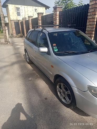 dot 4: Mazda 323: 2002 г., 1.6 л, Механика, Бензин, Универсал — 8