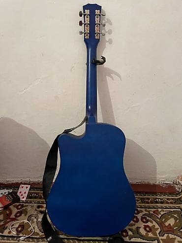 Акустическая гитара с вырезом (дредноут) - Корпус формы дредноут с