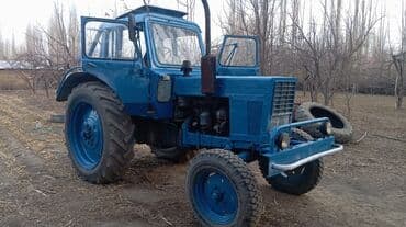 купить резину на трактор: Трактор колесный, с кабиной. Синяя окраска, передний бампер с — 2