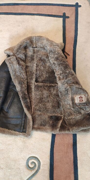 Дублёнка с капюшономпр-во Турция размер 48-50 (очень тёплая )