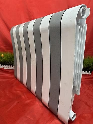 Биметаллический радиатор отопления, секционный. Описание: -