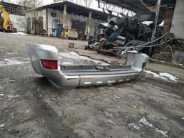 На Тойота 4- runner 2003-05 бампер задний