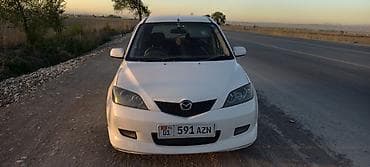 продаю рассрочку: Mazda Demio: 2003 г., Бензин — 7