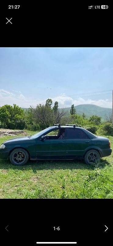 Продажа авто: Mazda 323: 2001 г., 2 л, Автомат, Седан — 2