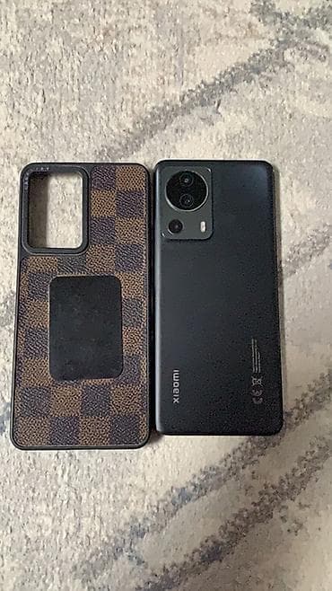Xiaomi, 13 Lite, Б/у, 256 ГБ, цвет - Черный, 2 SIM — 2