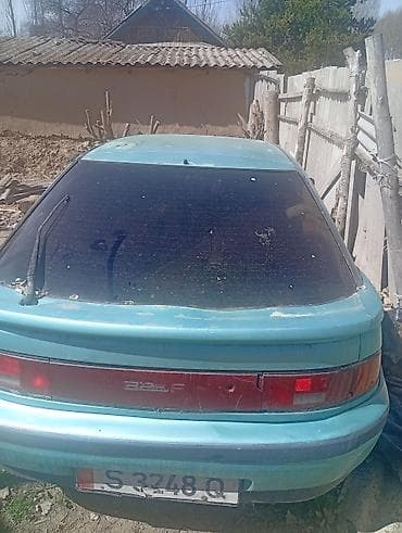 Mazda 323: 1992 г., Хэтчбэк