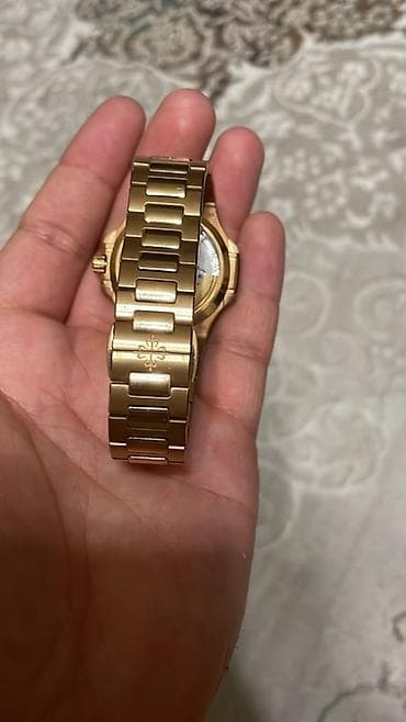constantine meteor: Наручные часы Patek Philippe Nautilus в корпусе и браслете из розового — 2