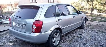 кассеты аудио: Mazda 323: 2002 г., 1.3 л, Механика, Лифтбек — 2