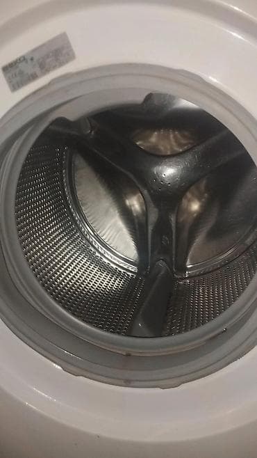 Техника для уборки: Стиральная машина Beko, фронтальная загрузка, загрузка до 7 кг. Класс — 4