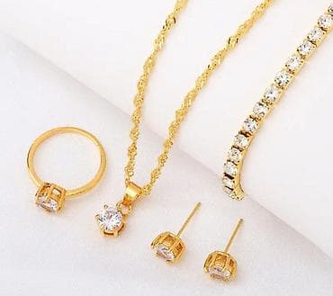 Свадебные платья и аксессуары: Все по 490 сом Ювелирные наборы с камнями (бижутерия) Состав каждого — 7