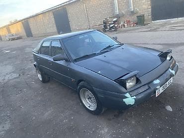 спартивный авто: Mazda 323: 1990 г., 1.6 л, Механика, Бензин, Седан — 2