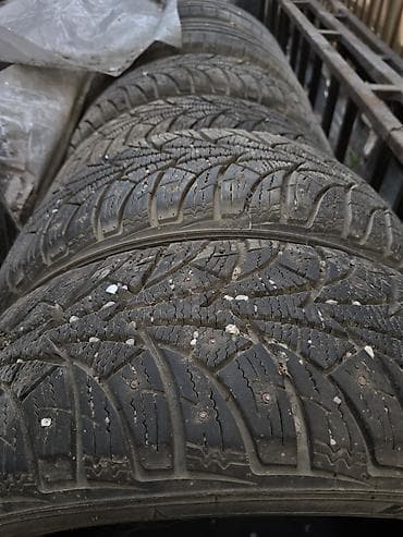шипованная: Шины зимние шипованные Rosava 215/60 R16 95T Процент протектора 90% - — 3