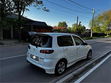Mazda Demio: 2004 г., 1.3 л, Автомат, Бензин, Хэтчбэк