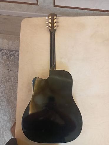 Музыкальные инструменты: Электроакустическая гитара, корпус дредноут с вырезом (cutaway) — 2