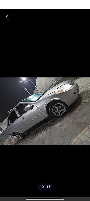 zero x neo: Toyota Platz: 2010 г., 1.6 л, Механика, Седан — 1