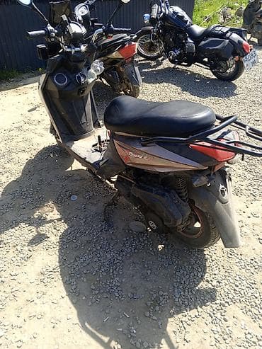 скутер 50: Скутер (бензиновый), городского класса. Характеристики и оснащение: - — 2