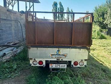 мини борт: !Kia Bongo III (Hi-Truck) — компактный бортовой грузовик. Основные — 3