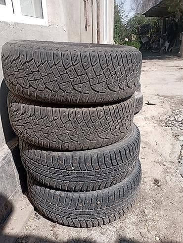 пароги на авто: Зимние шипованные шины, комплект из 4 шт. - Размер: 195/65 R15 - — 2