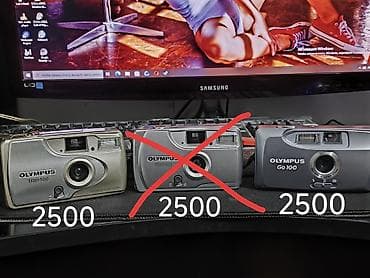 Пленочные компактные фотоаппараты Olympus: 1) Olympus Trip 500 - 35