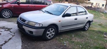 купить запчасти на опель вектра б: Mazda 323: 1998 г., Бензиновая, Седан — 2