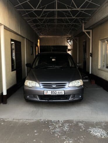 салон одиссей: Honda Odyssey: 2001 г., 2.3 л, Автомат, Газ, Универсал — 7