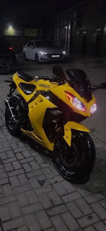 новые мотоциклы: Яркий спортбайк Yamaha в агрессивном стиле. Основные особенности: - — 1