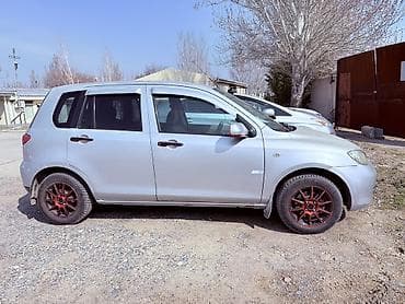 Mazda Demio: 2003 г., 1.3 л, Автомат, Бензин, Хэтчбэк