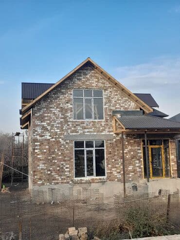 бочка 5 тонн: Двухэтажный кирпичный дом с мансардными фронтонами и террасой. ПСО — 4