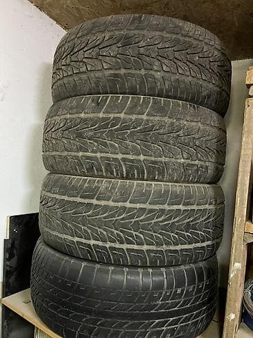 3 штуки автомобильных шин. Характеристики: - Размер: 265/60 R18 -